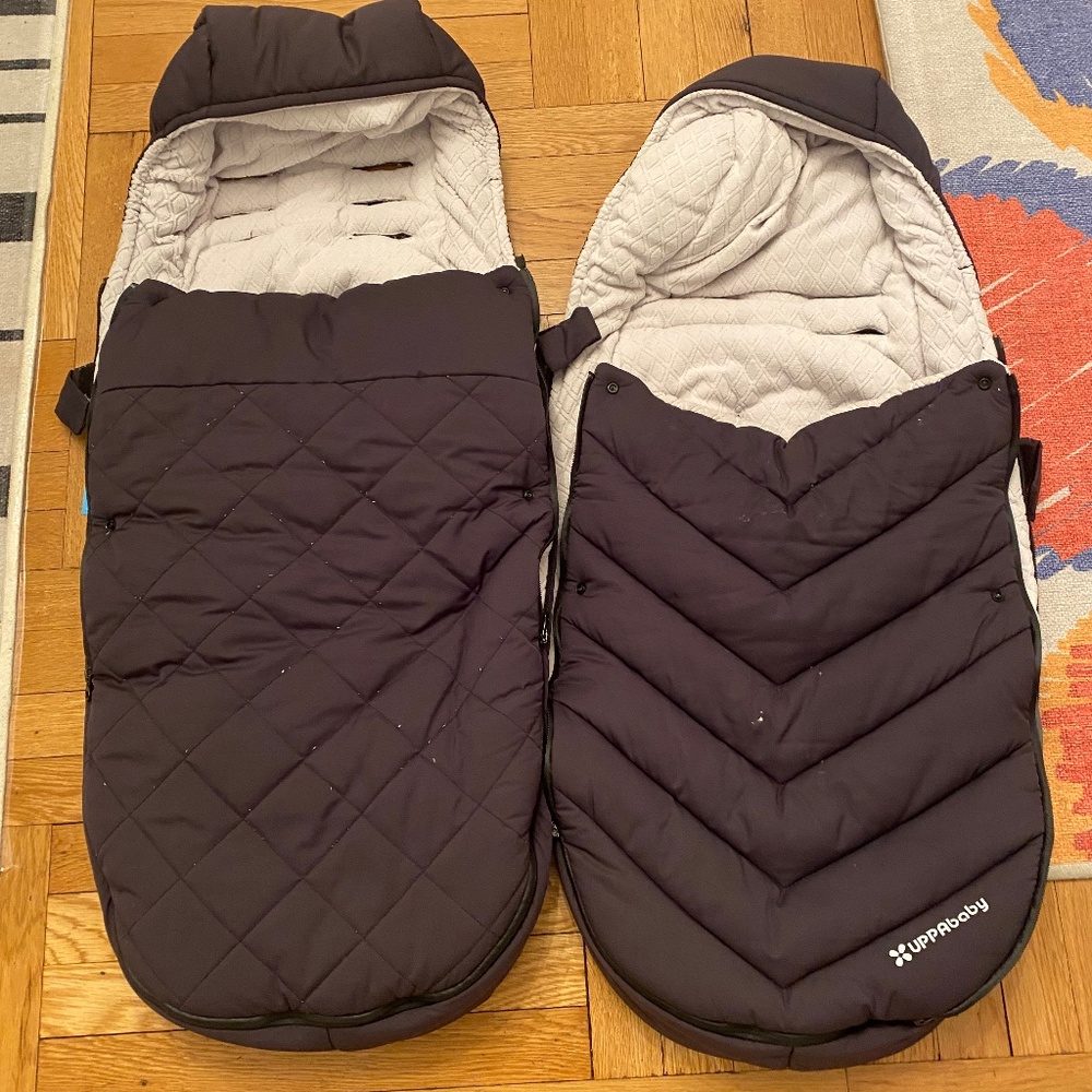 2 black UppaBaby Cozy Ganoosh